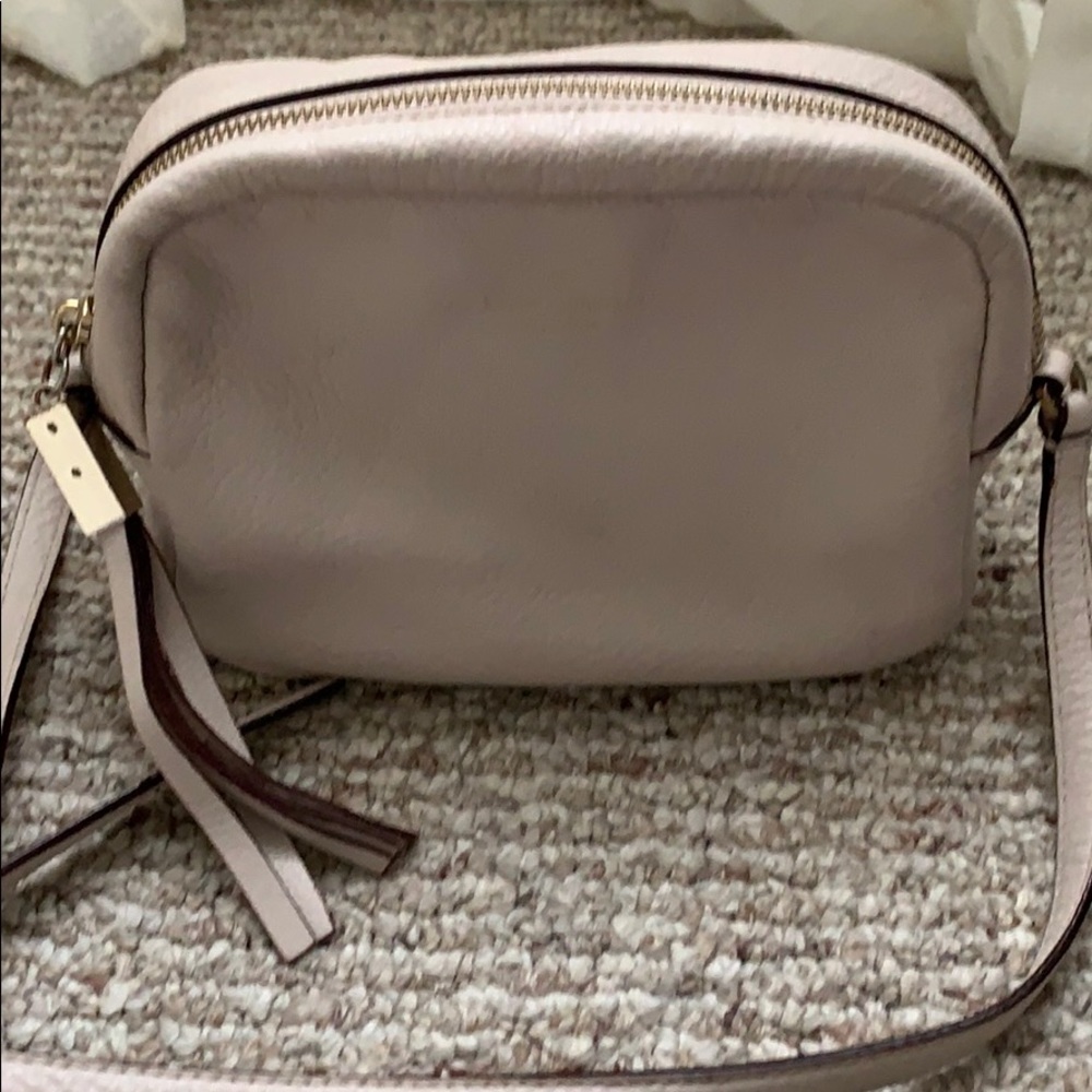Small Kate Spade crossbody bag.